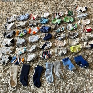 Huge lot of baby boy socks ~0-6 months, some may fit bigger than that